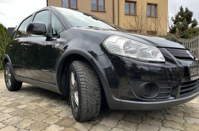 Suzuki SX4 cena 19900 przebieg: 143000, rok produkcji 2008 z Wisła małe 497